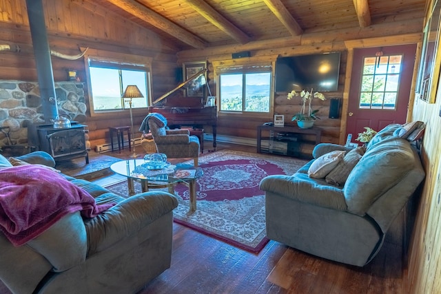 347 Upper Ross Gulch Rd, Townsend, MT 59644 - living area with hardwood / wood-style floors, a wood stove, rustic walls, a wood ceiling with exposed beams, and a baseboard heating unit
