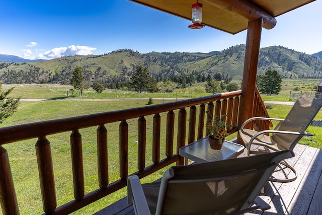 347 Upper Ross Gulch Rd, Townsend, MT 59644 - wooden deck with a mountain view, a view of rural / pastoral area, and a yard