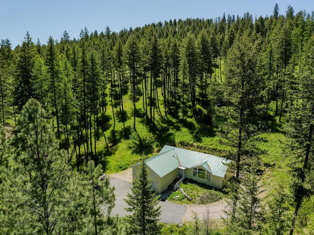 42843 Jette Lake Trl, Polson, MT 59860 - aerial view of property and surrounding area featuring a heavily wooded area