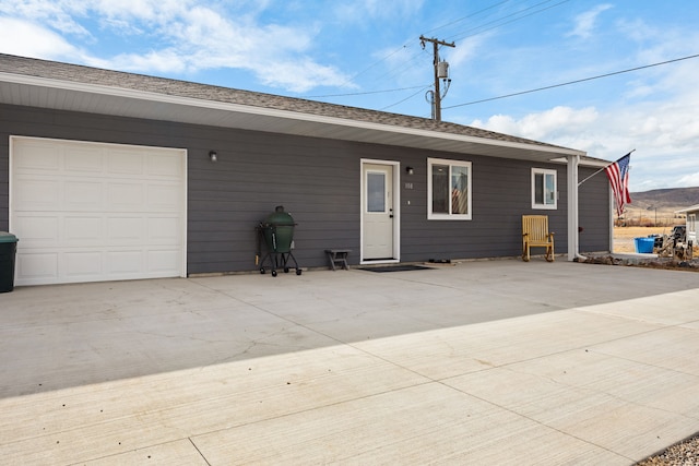 108 Timmons St, Dillon, MT 59725 - back of property featuring driveway and a garage