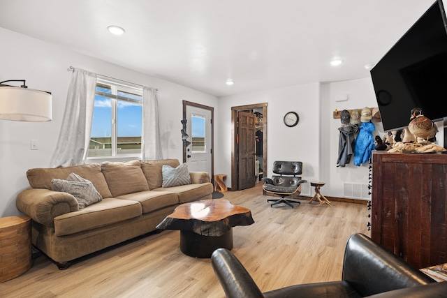 108 Timmons St, Dillon, MT 59725 - living area featuring light wood finished floors and recessed lighting