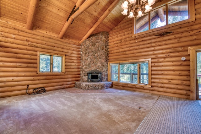 1795 E Fork Rd, Sula, MT 59871 - unfurnished living room with high vaulted ceiling, a chandelier, wood ceiling with exposed beams, a fireplace, and carpet