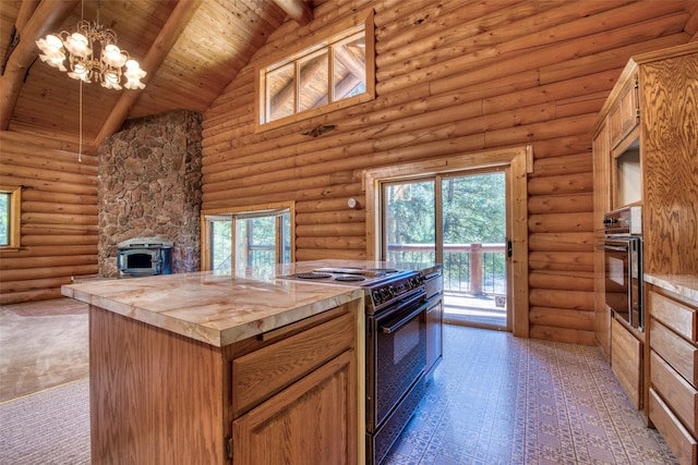 1795 E Fork Rd, Sula, MT 59871 - kitchen with black appliances, high vaulted ceiling, wooden ceiling with exposed beams, a chandelier, and wood counters