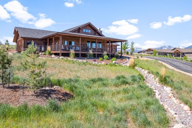 144 Prickly Pear Ct, Florence, MT 59833 - view of front of home featuring a porch and board and batten siding