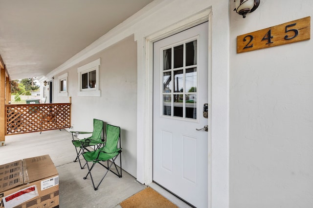 245 Marcus St, Hamilton, MT 59840 - view of exterior entry with stucco siding