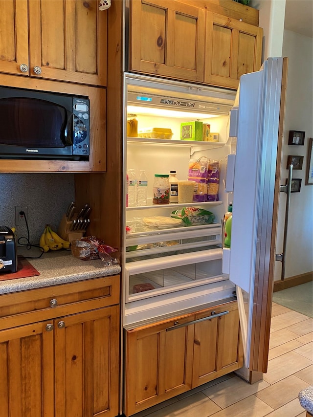 50-60 Willow Bend Ln, Cascade, MT 59421 - kitchen featuring black microwave and brown cabinetry