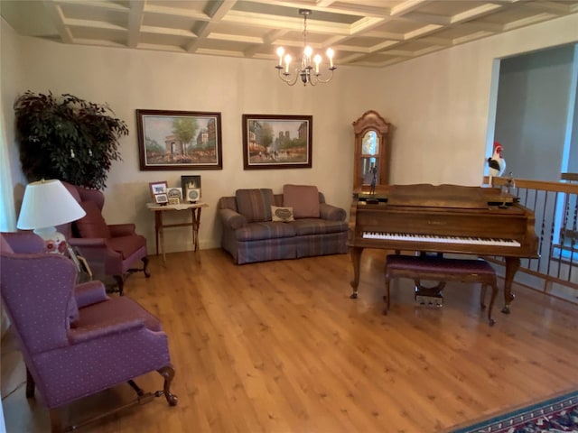 50-60 Willow Bend Ln, Cascade, MT 59421 - living area with coffered ceiling, wood finished floors, a chandelier, and beam ceiling