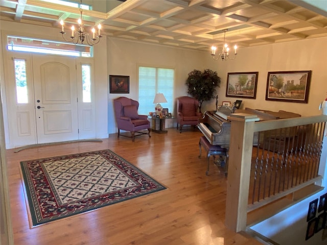 50-60 Willow Bend Ln, Cascade, MT 59421 - entryway featuring a chandelier, coffered ceiling, wood finished floors, and beam ceiling