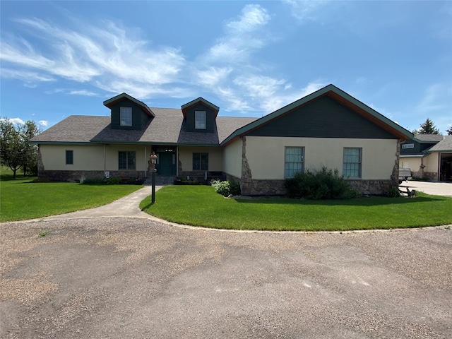 50-60 Willow Bend Ln, Cascade, MT 59421 - view of front of property with stone siding, a front yard, and stucco siding