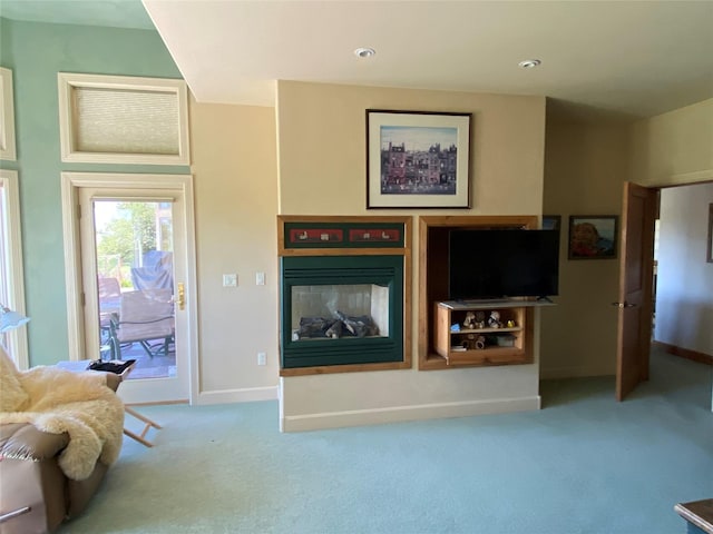50-60 Willow Bend Ln, Cascade, MT 59421 - carpeted living room with a glass covered fireplace and baseboards