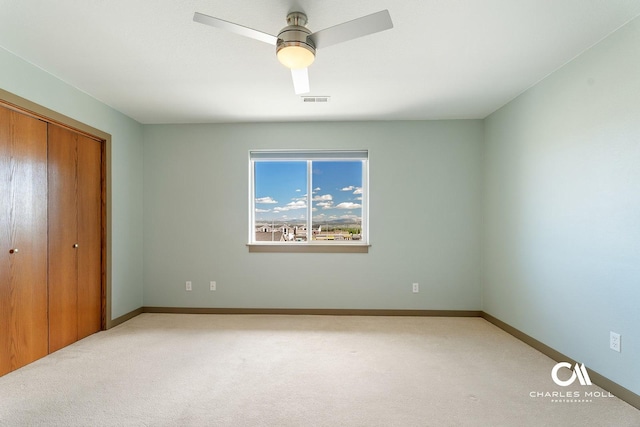 3036 Mchugh Ln, Helena, MT 59601 - unfurnished bedroom with a closet, carpet floors, and a ceiling fan