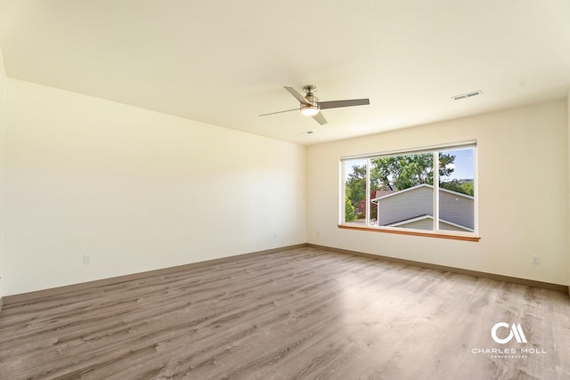 3036 Mchugh Ln, Helena, MT 59601 - spare room with light wood-style floors and ceiling fan