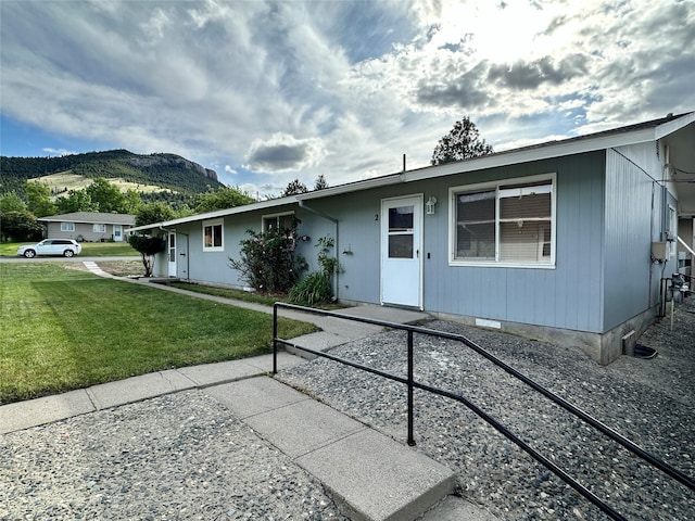 1112 Cannon St, Helena, MT 59601 - ranch-style house featuring a mountain view, a front yard, and crawl space