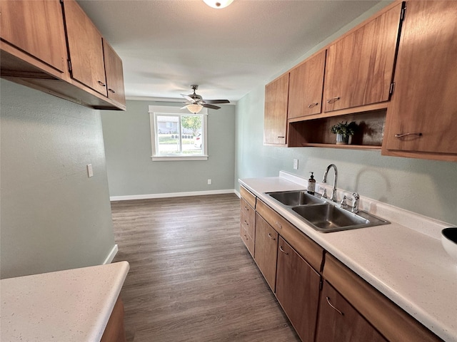 1112 Cannon St, Helena, MT 59601 - kitchen featuring a sink, ceiling fan, light countertops, open shelves, and baseboards