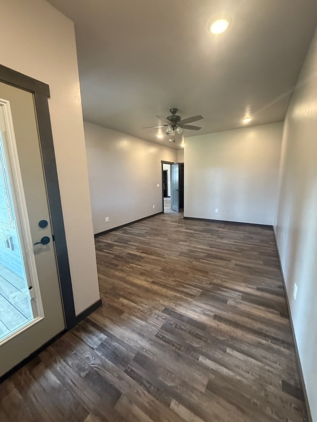 595 Grayling Rd, Lakeside, MT 59922 - empty room with dark wood finished floors and a ceiling fan