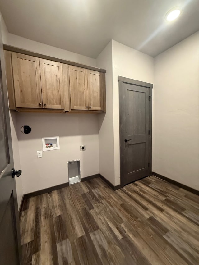 595 Grayling Rd, Lakeside, MT 59922 - laundry room with cabinet space, hookup for an electric dryer, dark wood finished floors, and washer hookup