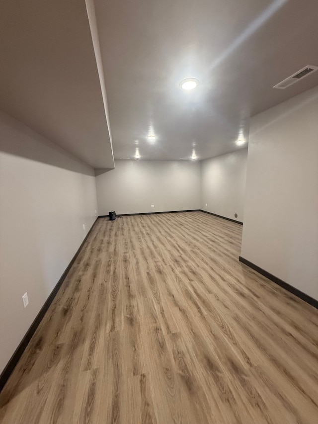 595 Grayling Rd, Lakeside, MT 59922 - additional living space with baseboards and wood finished floors