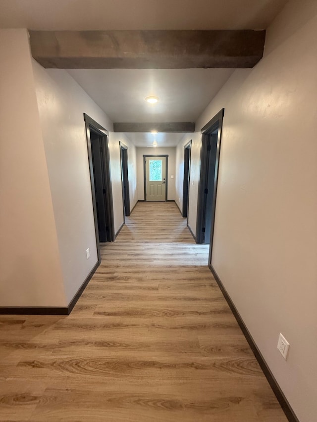 595 Grayling Rd, Lakeside, MT 59922 - hall featuring beam ceiling and light wood-style floors