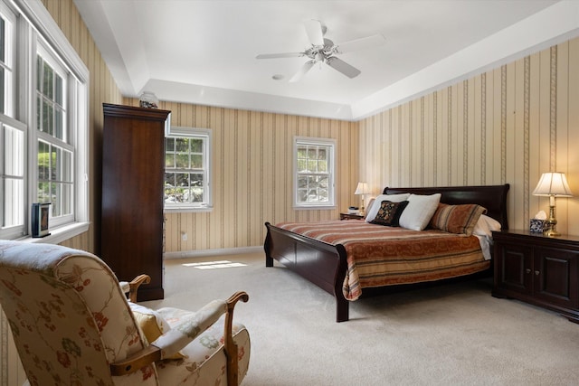 1 Reeders Village Dr, Helena, MT 59601 - bedroom featuring light colored carpet, wallpapered walls, ceiling fan, and baseboards