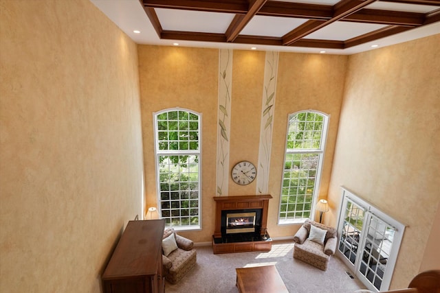 1 Reeders Village Dr, Helena, MT 59601 - living room with carpet flooring, a high end fireplace, beam ceiling, coffered ceiling, and a towering ceiling