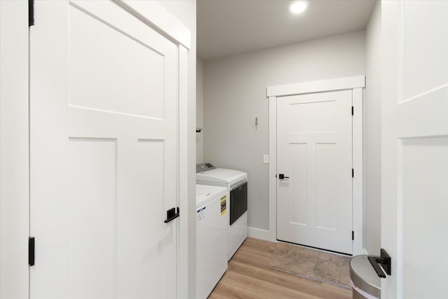 259 Meadow View Loop, East Helena, MT 59635 - laundry room with washer and clothes dryer, light wood-type flooring, and recessed lighting