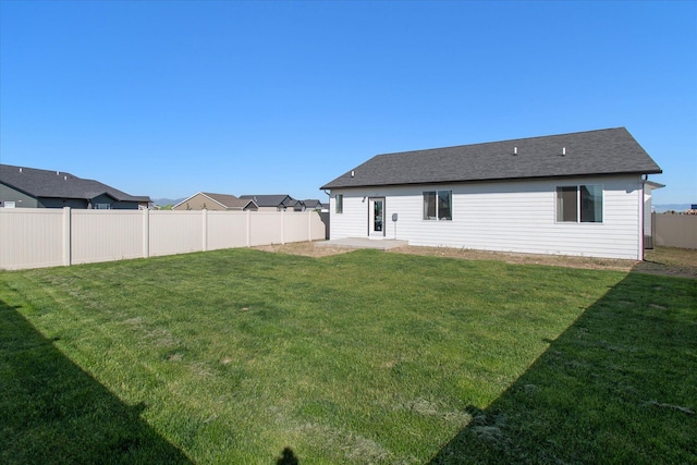 259 Meadow View Loop, East Helena, MT 59635 - rear view of property with a patio area and a shingled roof