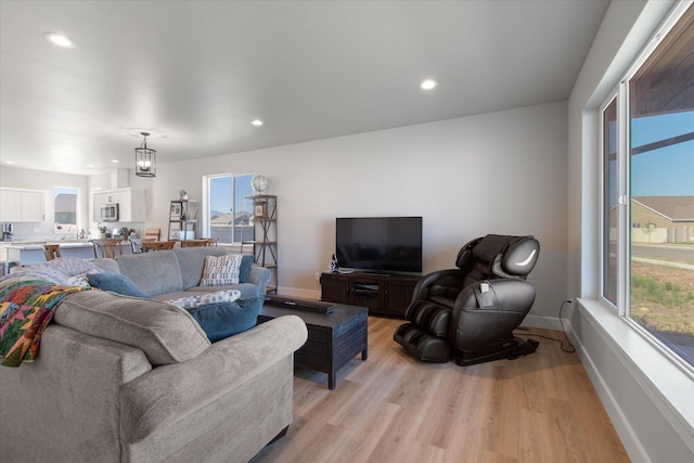 259 Meadow View Loop, East Helena, MT 59635 - living area with light wood-style flooring, recessed lighting, and baseboards