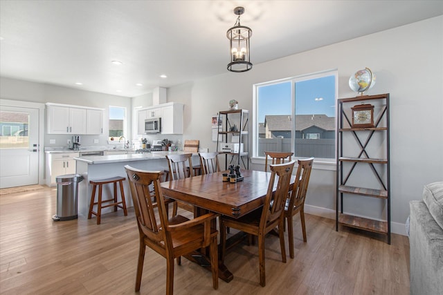 259 Meadow View Loop, East Helena, MT 59635 - dining area featuring light wood-type flooring, recessed lighting, and baseboards
