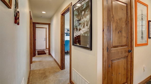 122 Bernie Rd, Alberton, MT 59820 - hall with light carpet, baseboards, and recessed lighting
