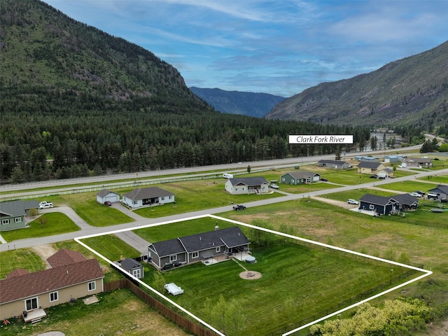 122 Bernie Rd, Alberton, MT 59820 - view of mountain backdrop featuring a heavily wooded area and nearby suburban area