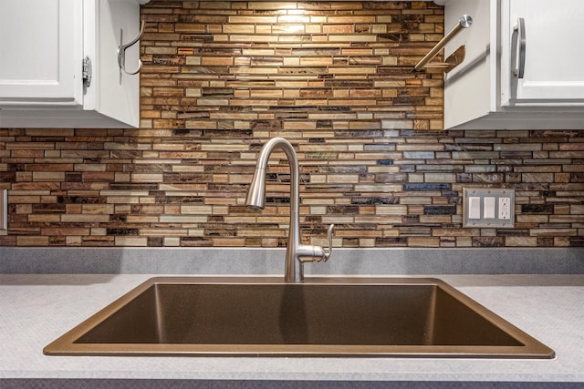 1861 E Broadway St, Missoula, MT 59802 - kitchen view of a sink, white cabinetry, and light countertops