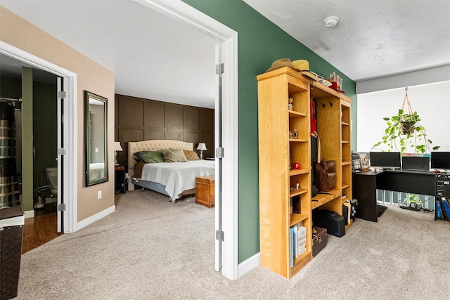 1861 E Broadway St, Missoula, MT 59802 - bedroom with carpet, an office area, and baseboards