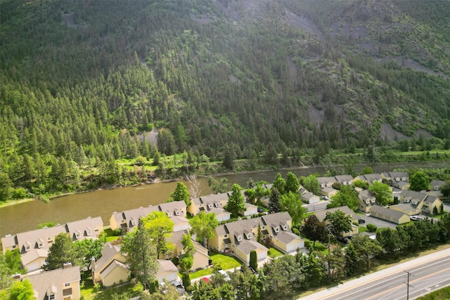 1861 E Broadway St, Missoula, MT 59802 - view of property location with a heavily wooded area, nearby suburban area, and a nearby body of water