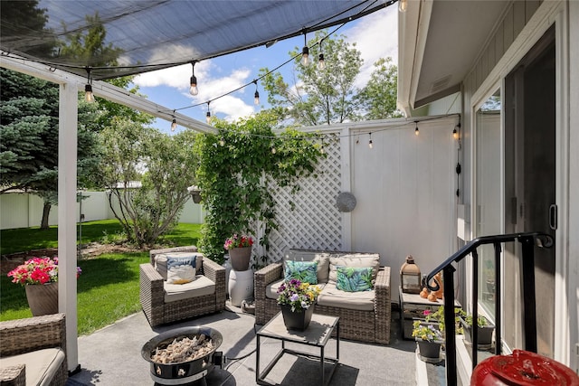 3717 Aster St, East Helena, MT 59635 - view of patio / terrace with an outdoor living space with a fire pit