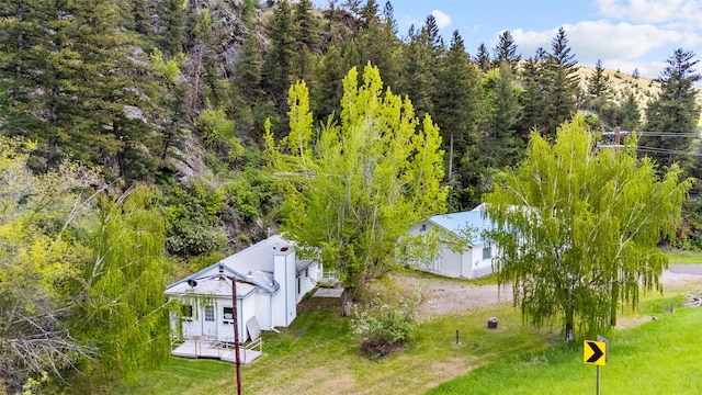 1160 US Highway 12 E, Townsend, MT 59644 - aerial view of property and surrounding area with a heavily wooded area