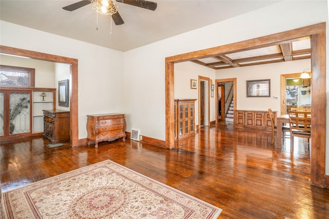 804 Broadway St, Townsend, MT 59644 - interior space featuring wood finished floors, coffered ceiling, ceiling fan, stairway, and plenty of natural light