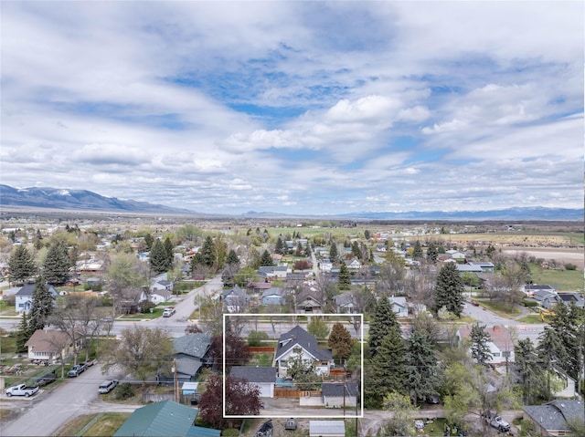 804 Broadway St, Townsend, MT 59644 - aerial view of residential area with property parcel outlined and mountains
