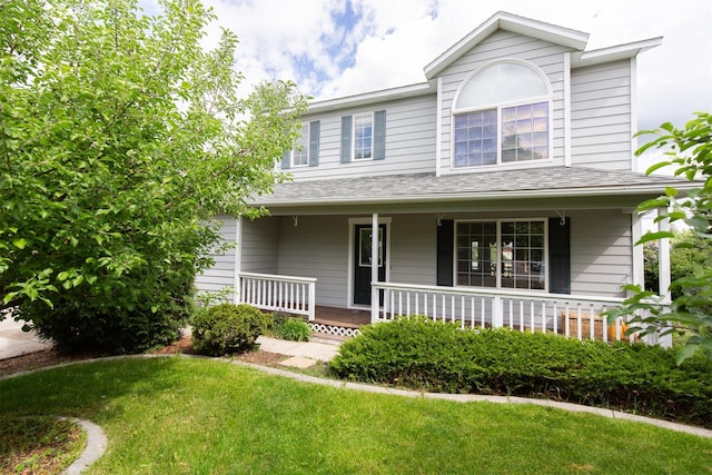 3401 Ravalli St, Bozeman, MT 59718 - view of front of home featuring covered porch and a front lawn