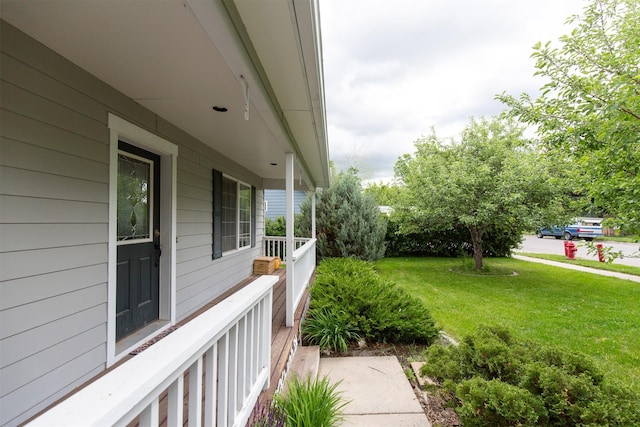 3401 Ravalli St, Bozeman, MT 59718 - view of grassy yard featuring a porch