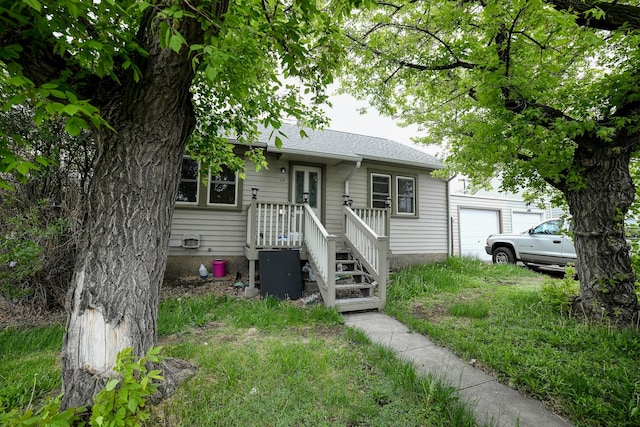 17 9th St NW, Great Falls, MT 59404 - bungalow-style house with a garage