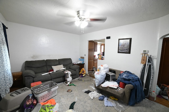 17 9th St NW, Great Falls, MT 59404 - living area featuring ceiling fan and arched walkways