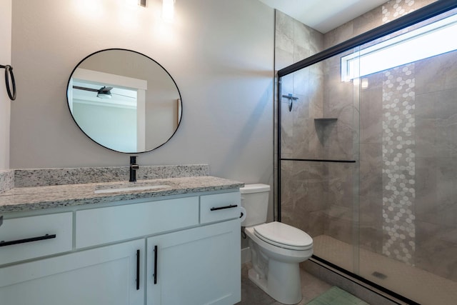2805 Travis Ave, Helena, MT 59601 - bathroom featuring a shower stall, vanity, and toilet