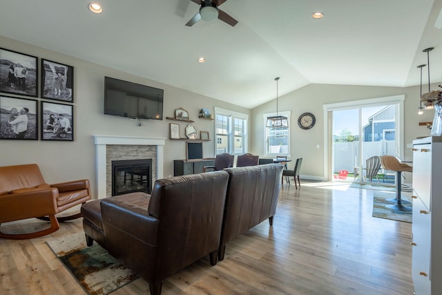 2805 Travis Ave, Helena, MT 59601 - living area with a fireplace, lofted ceiling, ceiling fan, light wood-style flooring, and recessed lighting