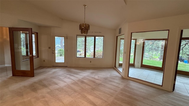 10 Pine Ridge Cir, Clancy, MT 59634 - interior space featuring lofted ceiling, a chandelier, light colored carpet, and baseboards