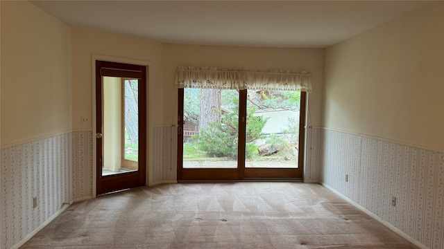 10 Pine Ridge Cir, Clancy, MT 59634 - unfurnished room featuring healthy amount of natural light, carpet flooring, and wallpapered walls