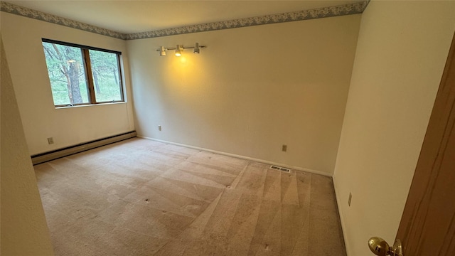 10 Pine Ridge Cir, Clancy, MT 59634 - carpeted spare room featuring a baseboard radiator and baseboards