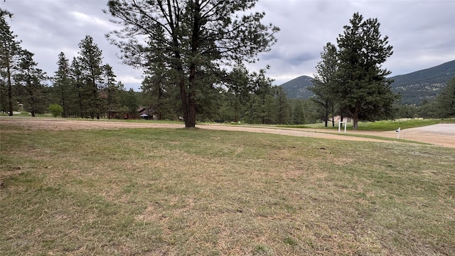 10 Pine Ridge Cir, Clancy, MT 59634 - view of grassy yard featuring a mountain view