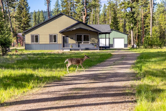 165 Lynx Ct, Seeley Lake, MT 59868 - view of front of property featuring driveway and a detached garage