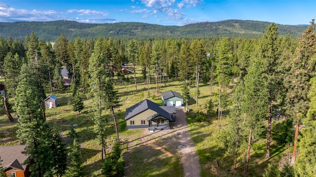 165 Lynx Ct, Seeley Lake, MT 59868 - aerial view of property and surrounding area with a forest and a mountainous background