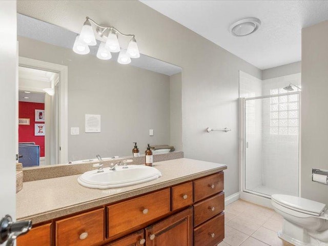 140 Fairway Dr, Missoula, MT 59803 - full bathroom with a shower stall, vanity, and tile patterned flooring